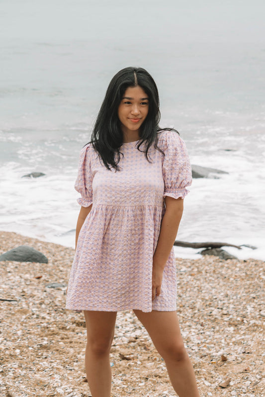 womens mini dress smock in pink and lilac gingham print with puff sleeves and adjustable back ties can be worn reversed