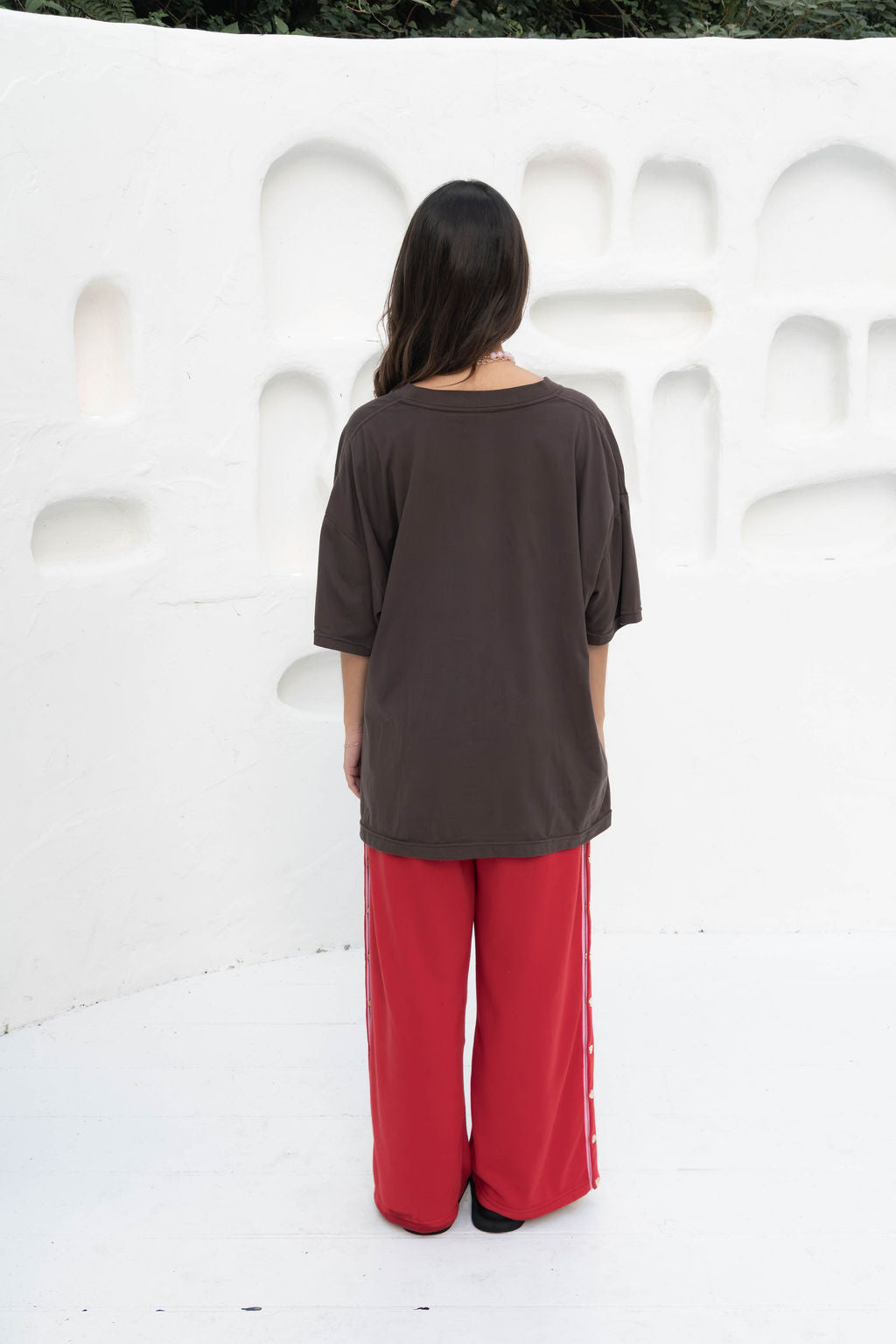 Oversized block-colour t-shirt in a rich espresso brown, featuring a ribbed neckline and relaxed fit. Crafted from 100% organic cotton for an ultra-soft feel.