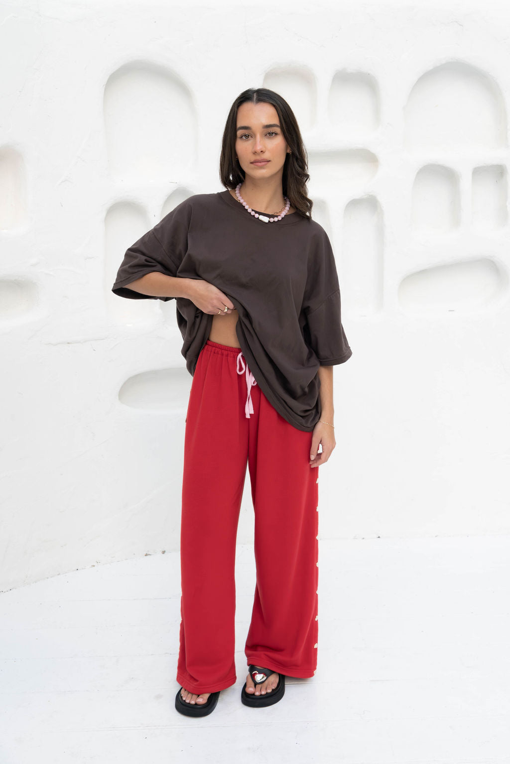 Oversized block-colour t-shirt in a rich espresso brown, featuring a ribbed neckline and relaxed fit. Crafted from 100% organic cotton for an ultra-soft feel.