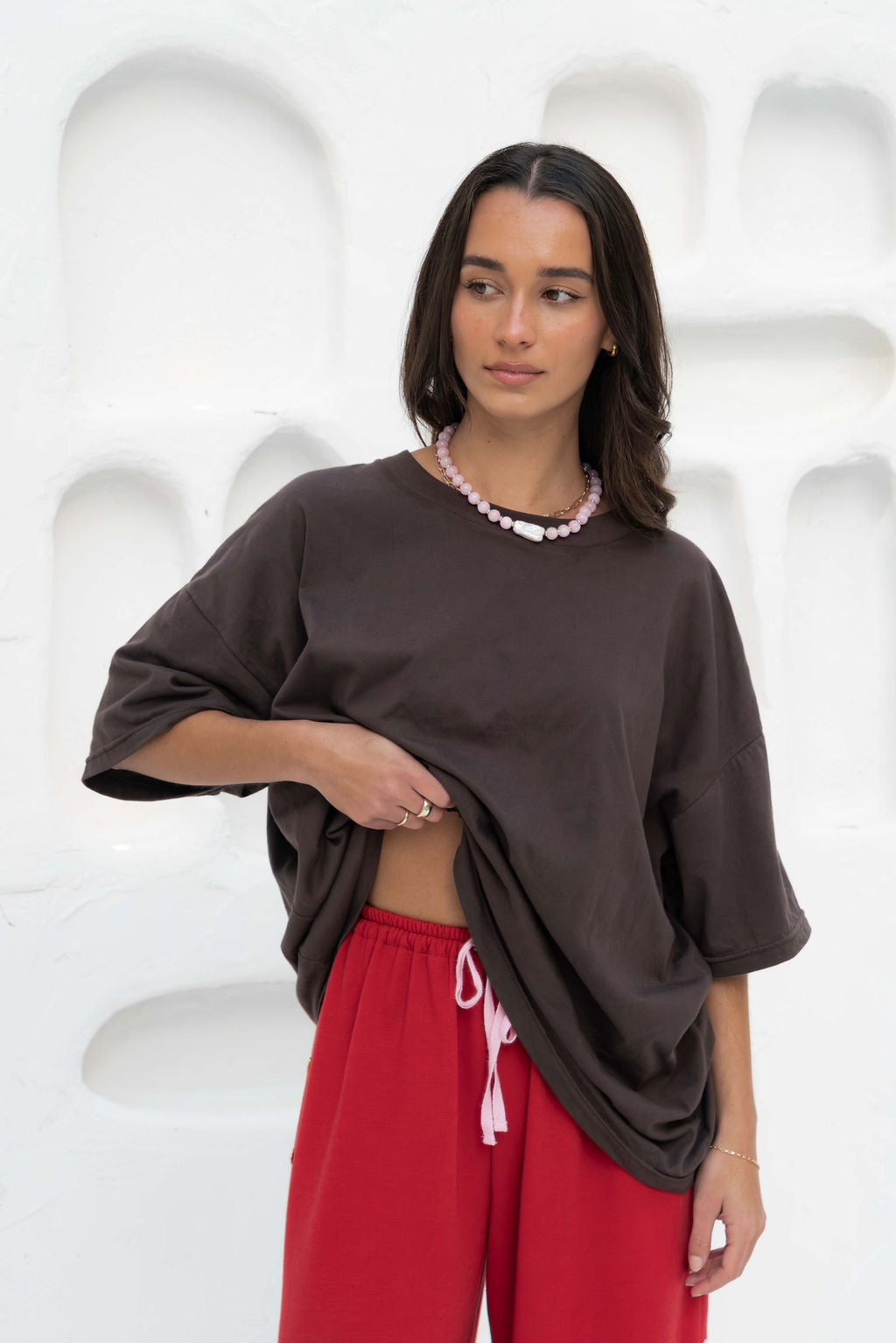Oversized block-colour t-shirt in a rich espresso brown, featuring a ribbed neckline and relaxed fit. Crafted from 100% organic cotton for an ultra-soft feel.