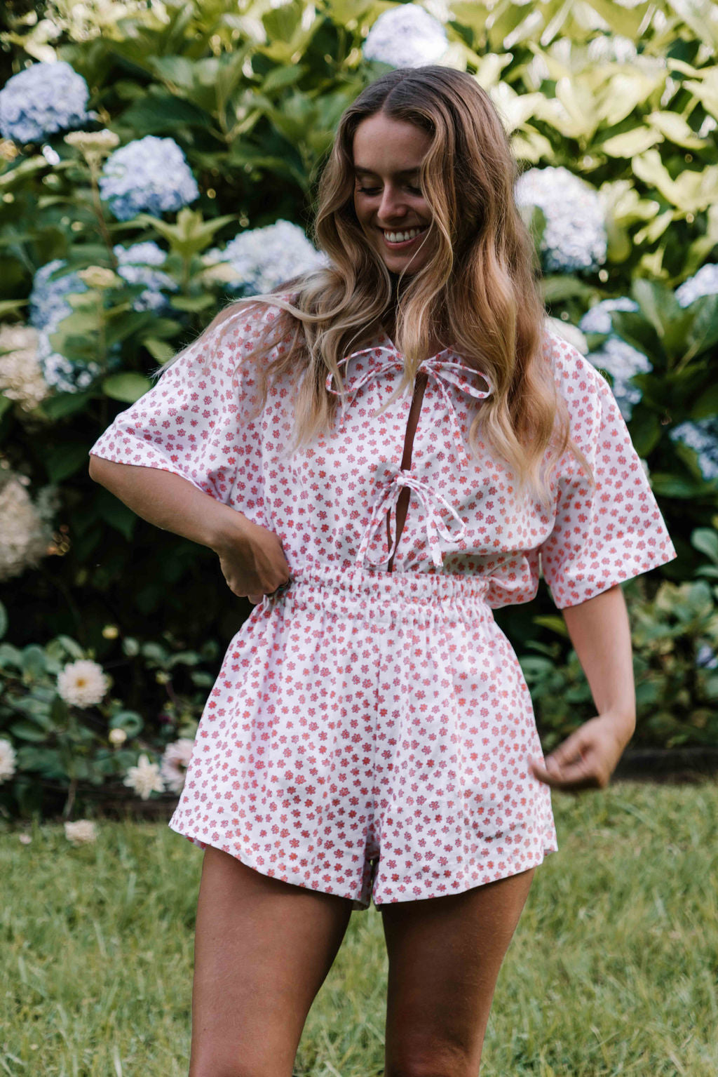 tie front blouse, boxy fit, centre front ties, sleeves to the elbow, small orange coral flower floral print, womens top