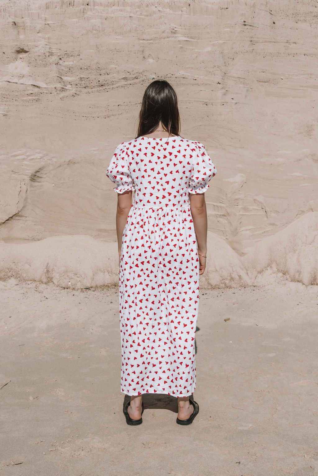 womens midi dress with button through front puffed short sleeves with a beautiful red love heart print