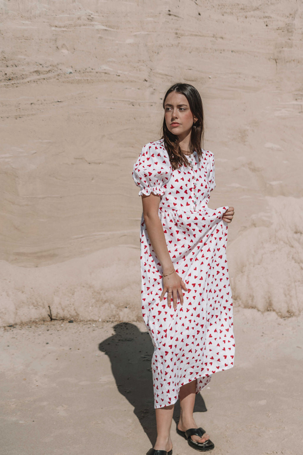 womens midi dress with button through front puffed short sleeves with a beautiful red love heart print