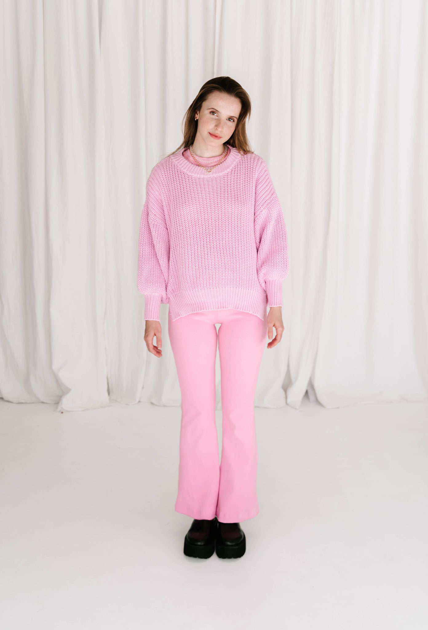 womens cable knit jumper wool cotton blend soft relaxed fit with balloon billowy sleeve feature in hibiscus pink purple