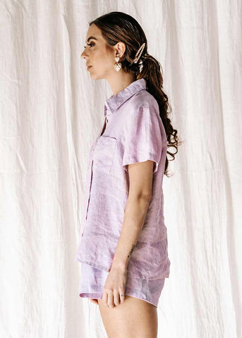 THE CAPRI | 100% LINEN  The new everyday blouse that will take you from sunrise to sunset, the Capri Shirt is so comfortable you’ll never want to take it off.  Match it back with the Etta Short for a two-piece set; tuck it in for an all-in-one jumpsuit look or left out for a more relaxed outfit.  The Capri can be dressed up with your favourite heel or worn with a slide for a more relaxed look.  Made from the highest quality linen fabric, that is cool & breathable to wear. 